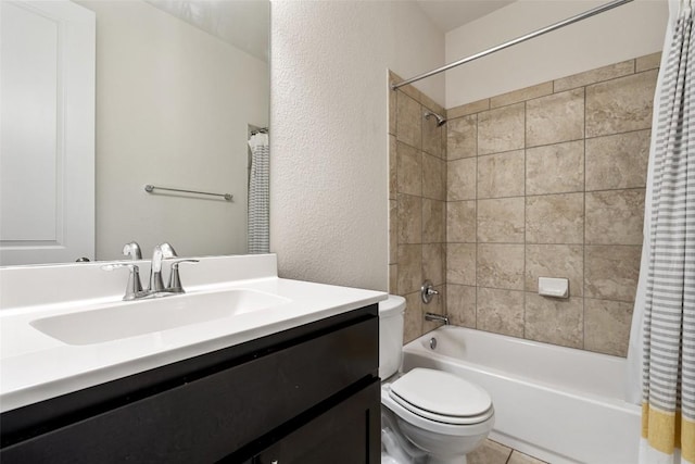 624 Anfield Cir, Austin, TX 78738 - bathroom with shower / tub combo, toilet, vanity, and a textured wall