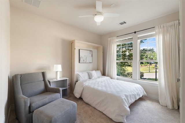 624 Anfield Cir, Austin, TX 78738 - bedroom featuring light carpet, a ceiling fan, and baseboards