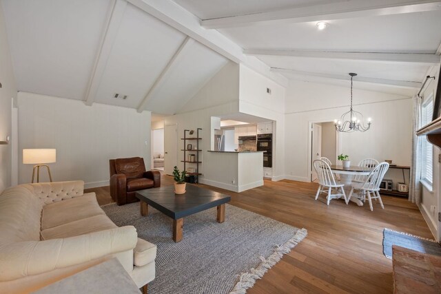 1314 Quailfield Cir, Austin, TX 78758 - living area with a chandelier and wood finished floors