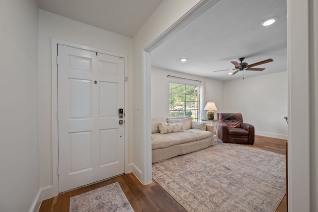 1314 Quailfield Cir, Austin, TX 78758 - foyer entrance with dark wood-style flooring, a ceiling fan, and recessed lighting