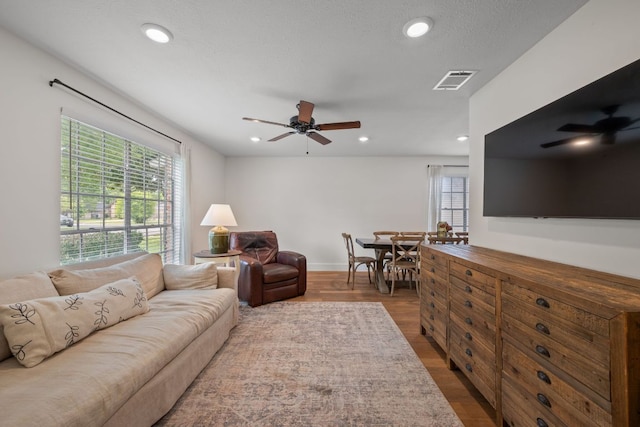 1314 Quailfield Cir, Austin, TX 78758 - living area featuring ceiling fan, recessed lighting, and wood finished floors