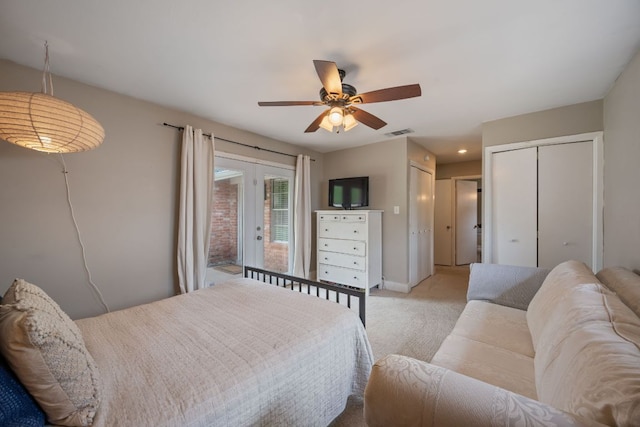 1314 Quailfield Cir, Austin, TX 78758 - bedroom featuring two closets, light carpet, ceiling fan, and access to outside