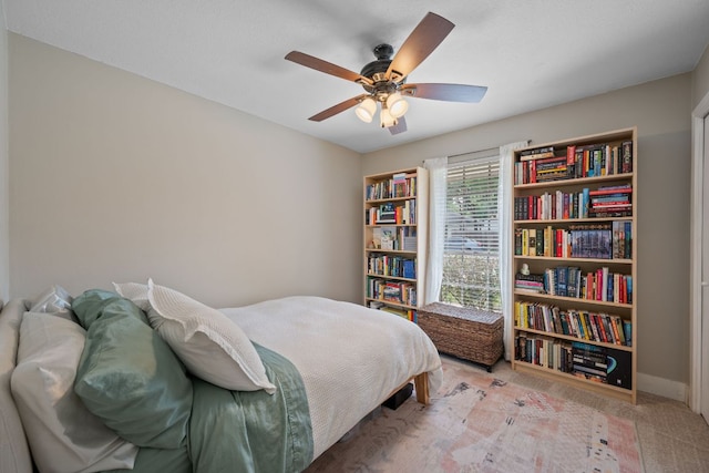 1314 Quailfield Cir, Austin, TX 78758 - bedroom featuring carpet floors and a ceiling fan
