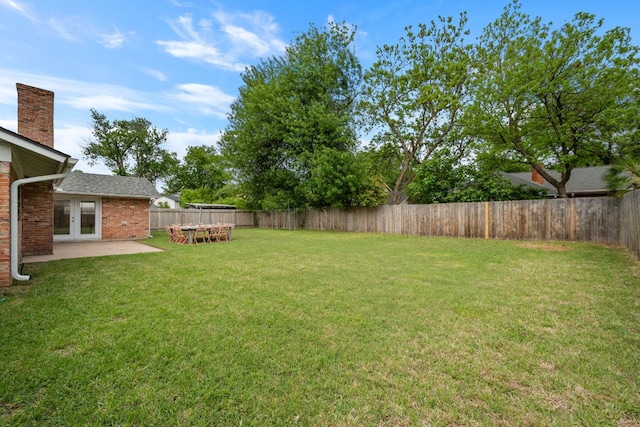 1314 Quailfield Cir, Austin, TX 78758 - fenced backyard featuring a patio area and french doors