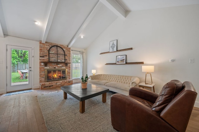 1314 Quailfield Cir, Austin, TX 78758 - living room featuring hardwood / wood-style floors and a fireplace