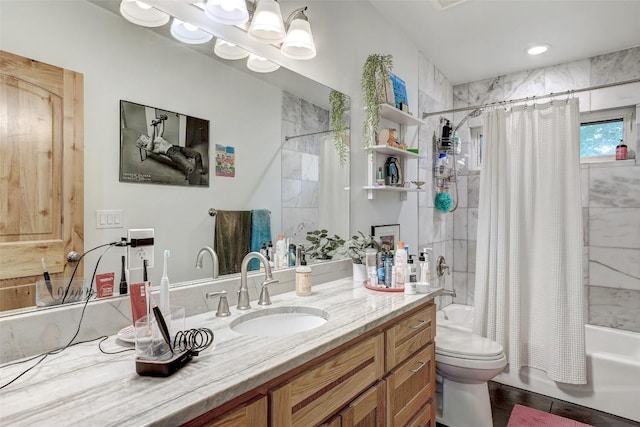 809 E 44th St, Austin, TX 78751 - bathroom featuring vanity, shower / bath combo with shower curtain, and toilet