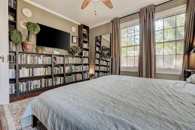 809 E 44th St, Austin, TX 78751 - bedroom with ornamental molding and wood finished floors