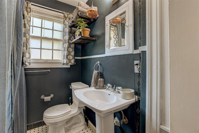 809 E 44th St, Austin, TX 78751 - bathroom with toilet and baseboards