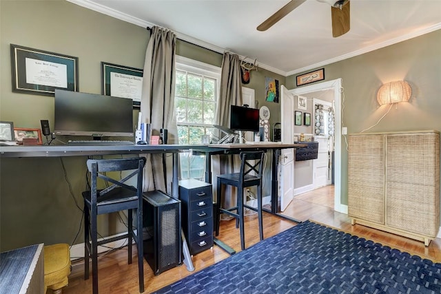 809 E 44th St, Austin, TX 78751 - kitchen with wood finished floors, an office area, a ceiling fan, and ornamental molding