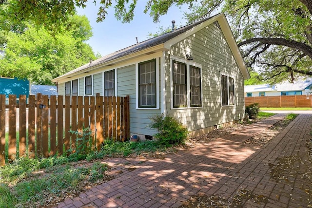 809 E 44th St, Austin, TX 78751 - view of home's exterior with a patio