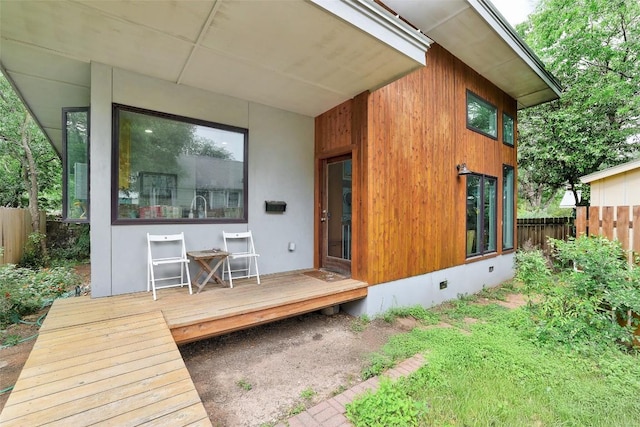809 E 44th St, Austin, TX 78751 - back of property featuring a wooden deck and crawl space