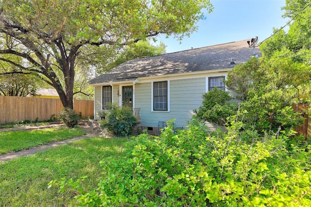 809 E 44th St, Austin, TX 78751 - view of front of property with roof with shingles and crawl space