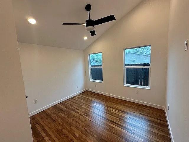 unfurnished room with recessed lighting, wood finished floors, baseboards, and ceiling fan