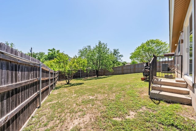 view of yard featuring a fenced backyard
