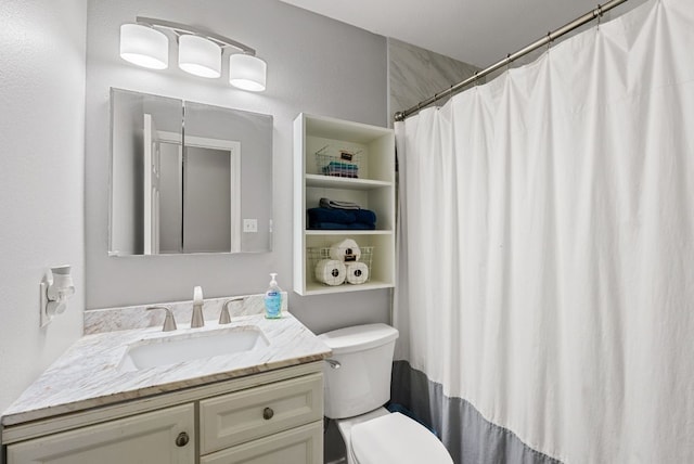 full bathroom with toilet, curtained shower, and vanity