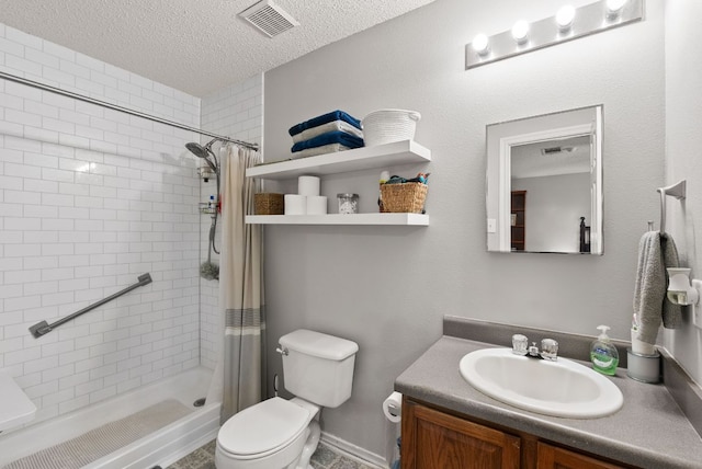 bathroom with a stall shower, toilet, a textured ceiling, and visible vents