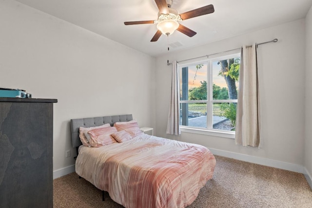 224 Highland Oaks, Leander, TX 78641 - bedroom featuring carpet, multiple windows, and ceiling fan