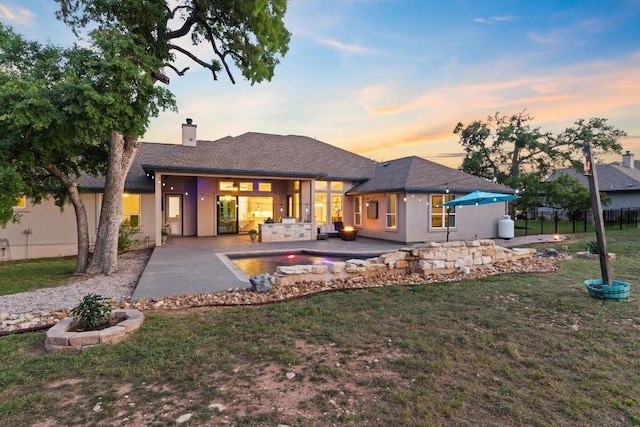224 Highland Oaks, Leander, TX 78641 - rear view of property with a patio area, a chimney, and stucco siding