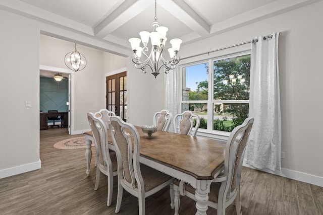 224 Highland Oaks, Leander, TX 78641 - dining space featuring a chandelier, wood finished floors, and beamed ceiling