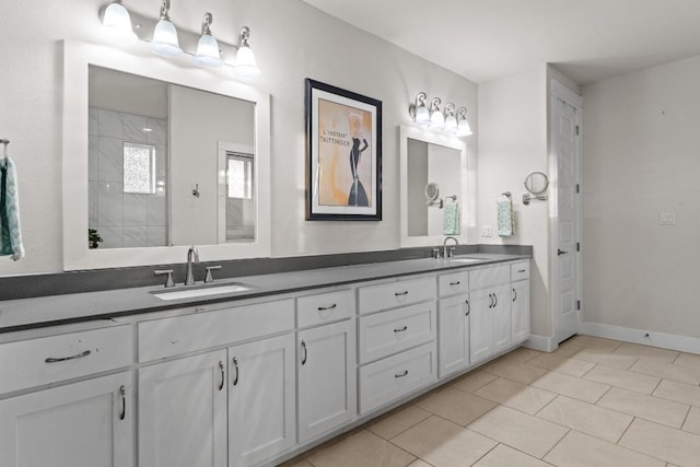 224 Highland Oaks, Leander, TX 78641 - full bath with double vanity, tile patterned flooring, and a tile shower
