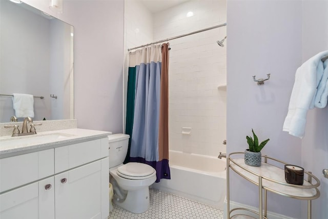 bathroom featuring shower / bath combination with curtain, toilet, tile patterned flooring, and vanity