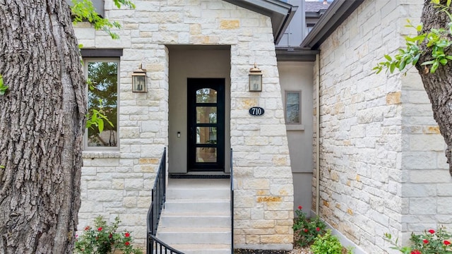 710 Crestone Stream Dr, Austin, TX 78738 - doorway to property featuring stone siding