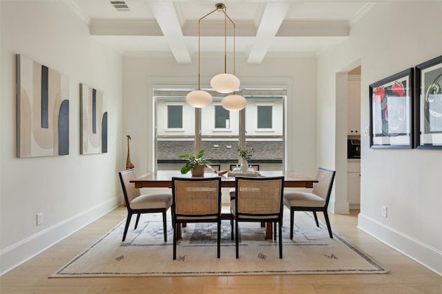 710 Crestone Stream Dr, Austin, TX 78738 - dining space featuring coffered ceiling, light wood finished floors, beamed ceiling, and ornamental molding
