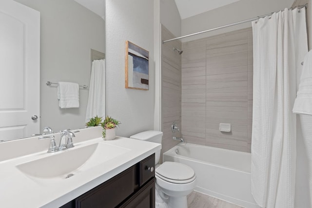 200 S Sage Holw, Dripping Springs, TX 78620 - full bathroom with wood finished floors, shower / tub combo with curtain, vanity, and toilet