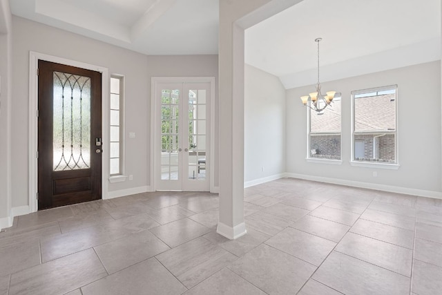 200 S Sage Holw, Dripping Springs, TX 78620 - entryway with a raised ceiling, an inviting chandelier, tile patterned flooring, and baseboards