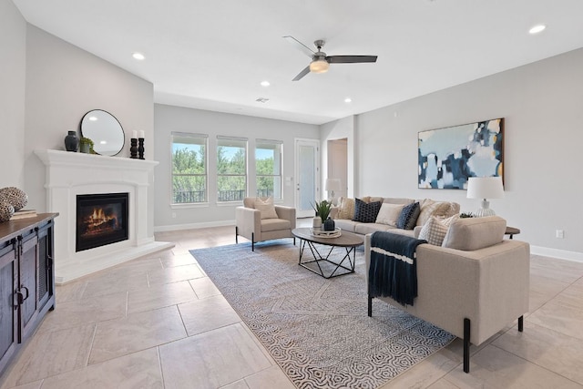 200 S Sage Holw, Dripping Springs, TX 78620 - living room with a glass covered fireplace, ceiling fan, baseboards, visible vents, and recessed lighting