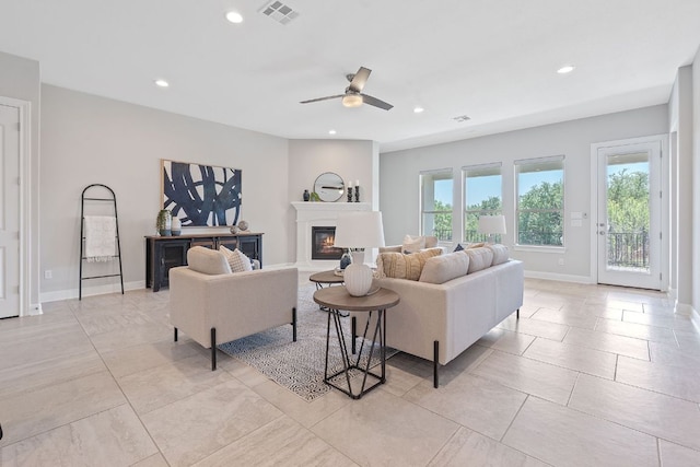 200 S Sage Holw, Dripping Springs, TX 78620 - living area with a ceiling fan, a glass covered fireplace, baseboards, visible vents, and recessed lighting