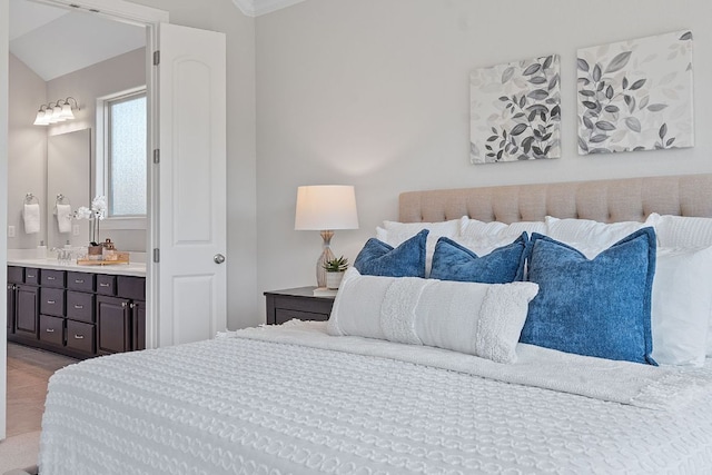 200 S Sage Holw, Dripping Springs, TX 78620 - bedroom with connected bathroom and crown molding