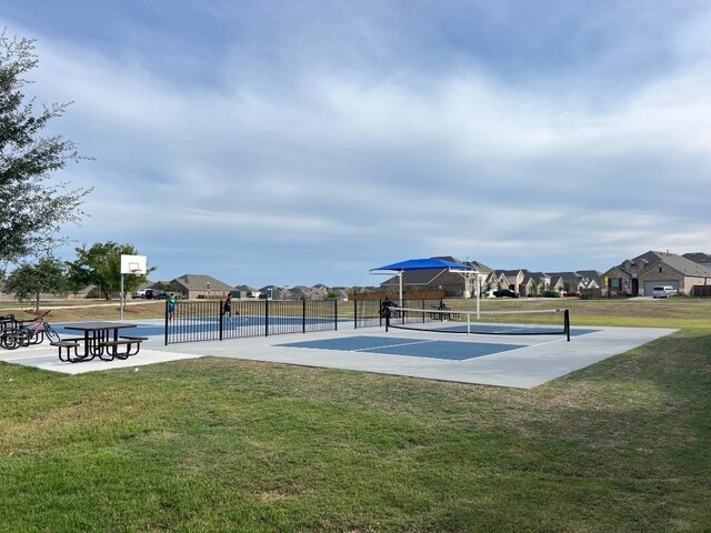577 Backstays Loop, Kyle, TX 78640 - view of home's community featuring a tennis court and a residential view