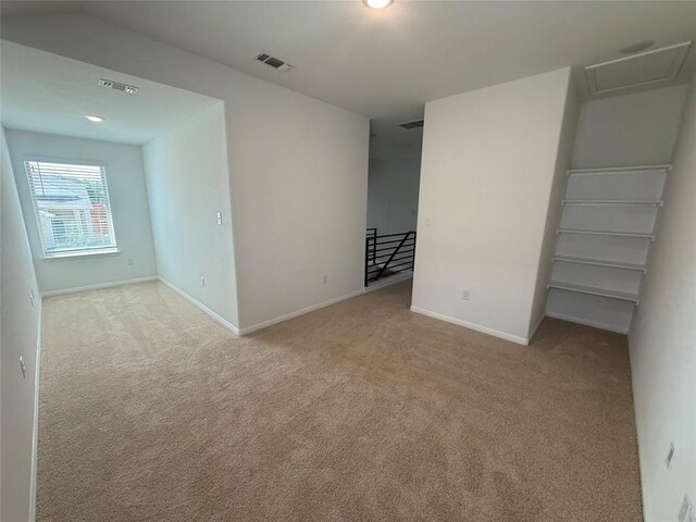 577 Backstays Loop, Kyle, TX 78640 - carpeted spare room with baseboards