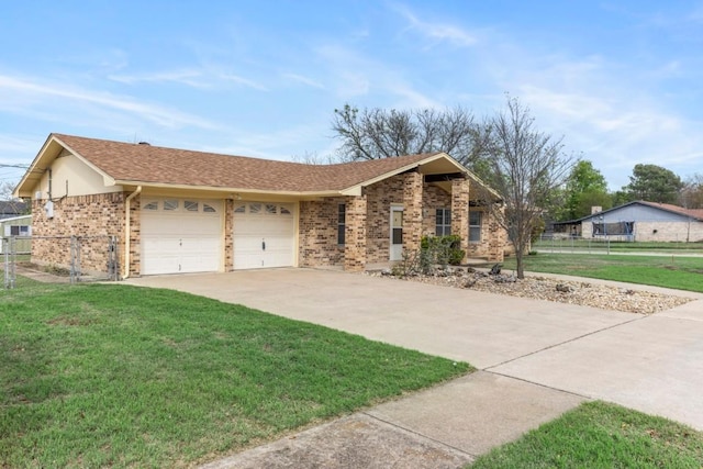 ranch-style house featuring fence, brick siding, a front yard, and a garage