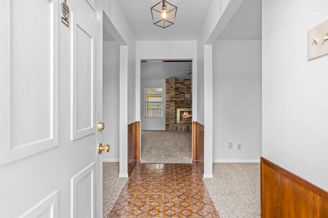 hall featuring carpet
