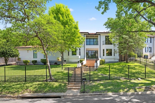 6103 Twin Ledge Dr, Austin, TX 78731 - view of front of property with stucco siding and a fenced front yard