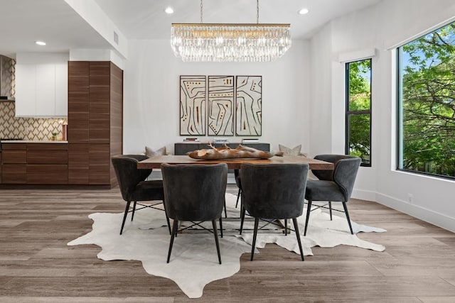 6103 Twin Ledge Dr, Austin, TX 78731 - dining area featuring a chandelier, light wood-type flooring, and recessed lighting