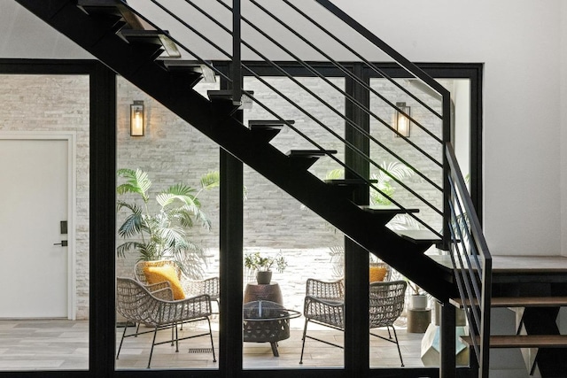 6103 Twin Ledge Dr, Austin, TX 78731 - staircase with wood finished floors and plenty of natural light