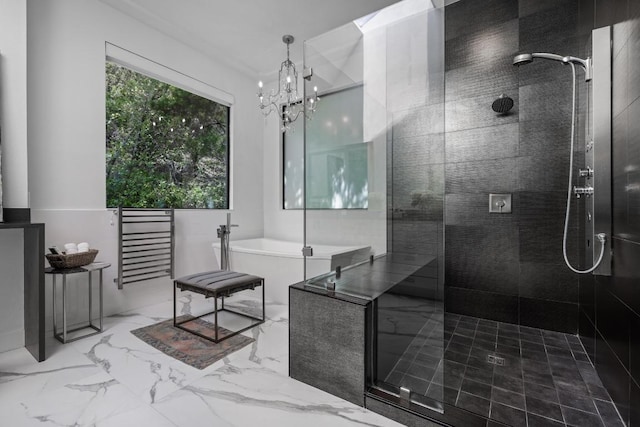 6103 Twin Ledge Dr, Austin, TX 78731 - full bath with a tile shower, a freestanding bath, a chandelier, and marble finish flooring
