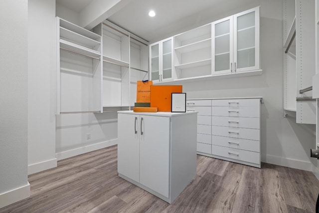 6103 Twin Ledge Dr, Austin, TX 78731 - walk in closet with wood finished floors
