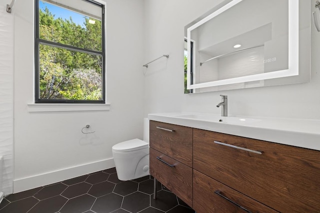 6103 Twin Ledge Dr, Austin, TX 78731 - full bath with plenty of natural light, vanity, and tile patterned floors