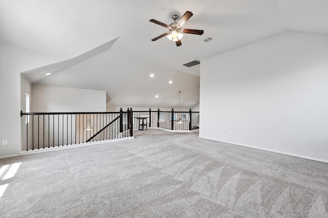 interior space with lofted ceiling, visible vents, recessed lighting, and ceiling fan
