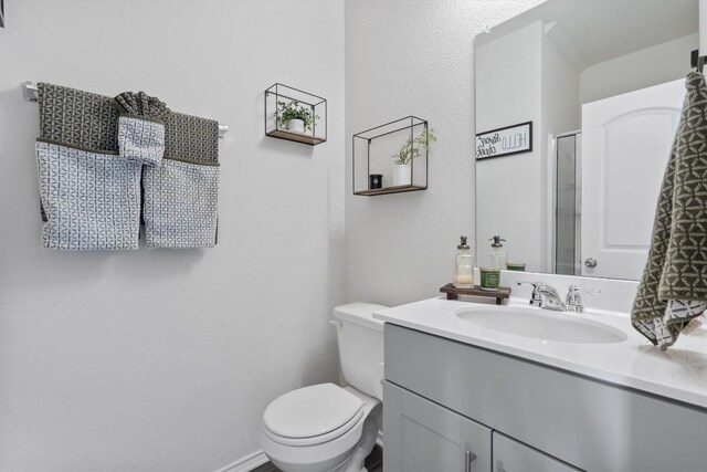 145 Fiery Skipper Ln, Georgetown, TX 78626 - bathroom featuring vanity and toilet
