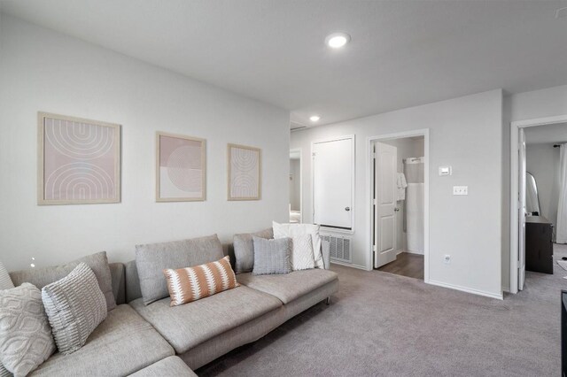 145 Fiery Skipper Ln, Georgetown, TX 78626 - carpeted living room with recessed lighting and baseboards