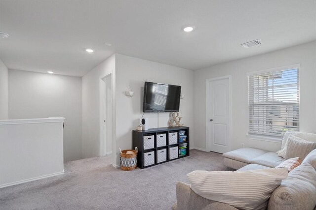 145 Fiery Skipper Ln, Georgetown, TX 78626 - carpeted living area with recessed lighting