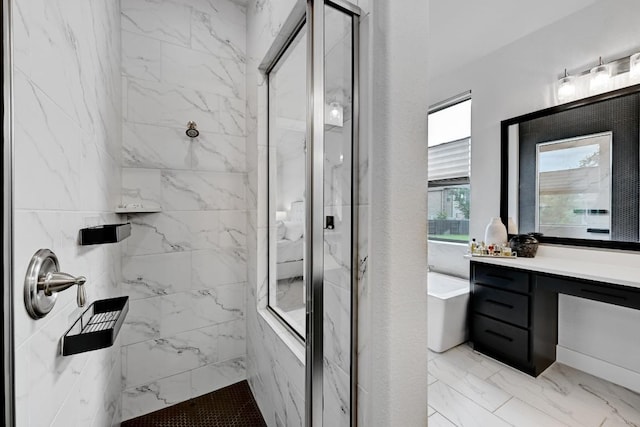 422 Quiet Oak Rd, San Marcos, TX 78666 - bathroom with vanity, marble finish floor, a freestanding tub, and a marble finish shower