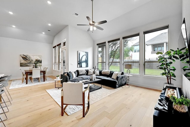 422 Quiet Oak Rd, San Marcos, TX 78666 - living room with vaulted ceiling, a ceiling fan, visible vents, and light wood-style flooring