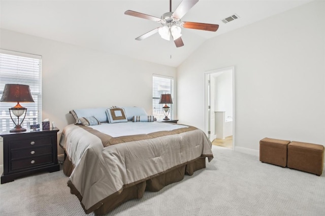 161 Caraway, Kyle, TX 78640 - bedroom with lofted ceiling, carpet, baseboards, a ceiling fan, and ensuite bath