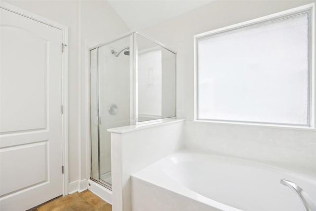 161 Caraway, Kyle, TX 78640 - bathroom featuring a shower stall and a garden tub